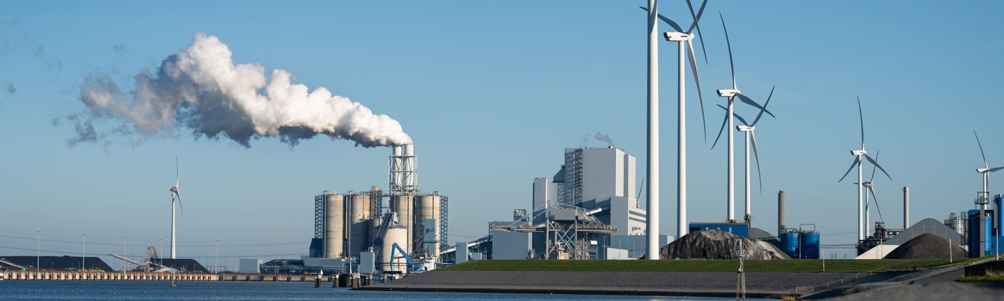 an image of a nuclear site with wind turbines