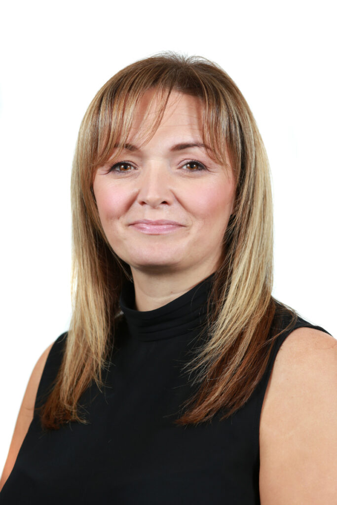 Headshot of Sarah Collins.